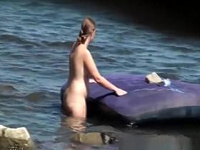 Chubby big tits woman in the water