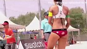 Cute beach volleyball players with great bodies