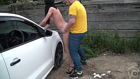 Naked blindfolded milf bent over the car and banged