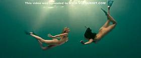 Busty naked swimmers make erotic underwater art