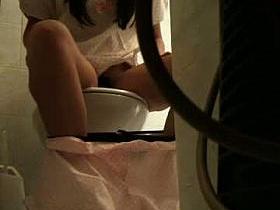 Peeing hidden cam captures babe emptying her bladder on the toilet