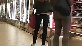 Tight jeans girl at supermarket