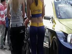 Car racing chicks in tight outfits
