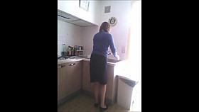Spy Mature Woman in kitchen