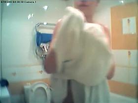 Sexy girl spied finishing her shower