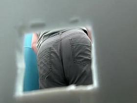 Chubby ass takes a pee in portable toilet