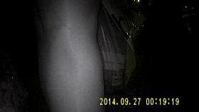 Shiny black pantyhose in night vision