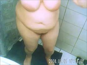 Here is my mature saggy wife with big titties on home hidden cam