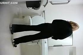 Public toilet spy cam catches woman peeing