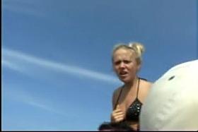 Blonde girl in bikini getting canned in public video