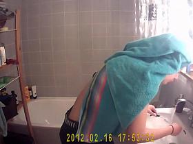 Hot girl's tits spied while washing teeth