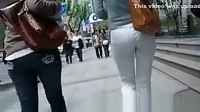 Tight pants woman bending over