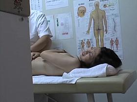 Voyeur massage video showing a Japanese gal finger fucked