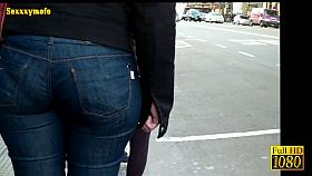 Brunette babe on the street in huge ass tight jeans video