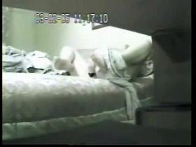 milf and her dildo. Hidden cam in bed room