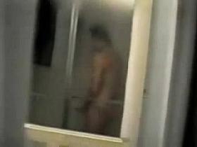 Spying my horny mum masturbating in shower