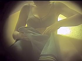 Hidden cam in changing room girl showing her bikini boobs