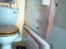 Wife filmed in shower