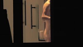 Naked girl washing her face and voyeured thru window