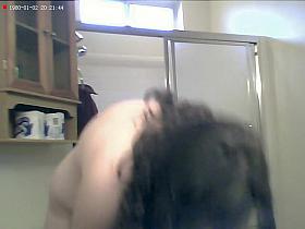 Voyeur amateur vid with brunette stripping in the shower