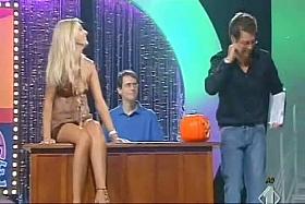 A stupid yet sexy blonde whore poorly dances on a live television show