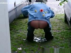 Woman caught pissing in public