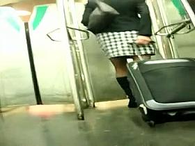 Hot slutty chick followed by an up skirt voyeur from the subway