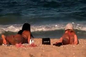 two Latin ass on the beach
