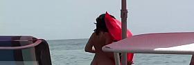 Cute nudist girl filmed voyeur at the beach