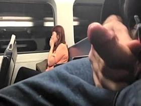 Train passenger can't believe what the guy next to her is doing!
