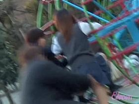 Two schoolgirls in the park getting skirt sharked by one guy