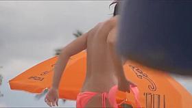 Voyeur video of topless babes on the beach