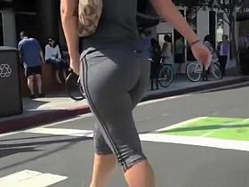 Big ass woman in tight gray sports shorts