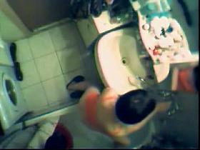 An enticing voyeur spy cam vid of a floozy in the shower