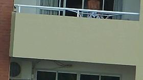 voyeur girl nude in balcony argentina . far away ( 200 m)