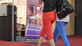 Street candid video with sexy blonde in red pants