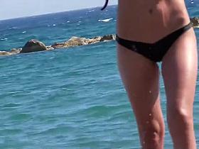 Incredible beach girl in a sexy bikini
