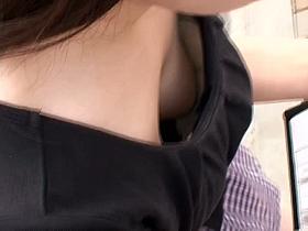 Sexy down blouse video of a smoking Asian chick in public