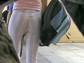 perfectly shaped ass stret candid in a seriously tight stripy trousers