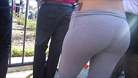Beautiful girl with a tight gray pants !