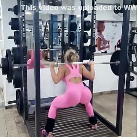 Stunning lass with a huge ass works out in the gym