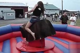 Bull ride uncovers the girl's pussy