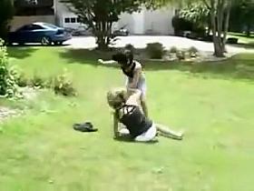 Suburban girls fight for real in the grass