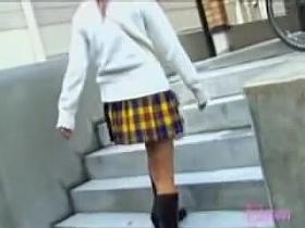 Seductive Japanese gal wears a short skirt in a sharking vid