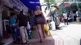 Big ass woman in tight mini skirt