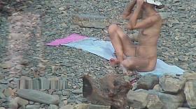 Nudist girls expose bodies at the beach