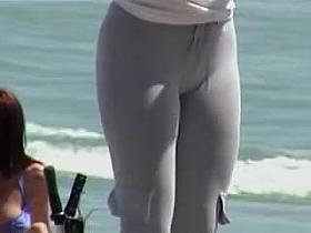 Long haired cutie with big candid ass spied on the beach 01zr