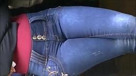 The beauty and grace of a brunette in jeans - soft
