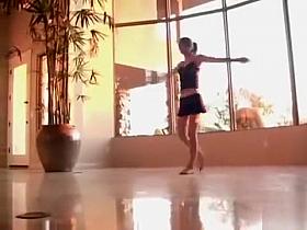 Flexible ballerina shows off her moves and her panties