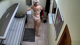 Older MILF Tanning her Shaved Tight Pussy